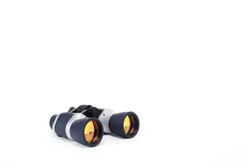 Black binoculars isolated over white background