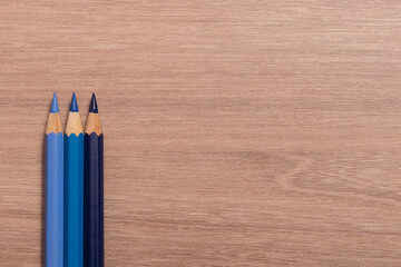 pencils on wooden table
