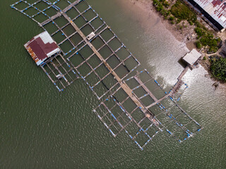 Aerial Drone image of cages of a large fish farm