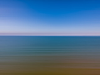 Fototapeta na wymiar Abstract blur background of sea and beach image for background and wallpaper use.
