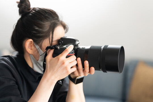 Fototapeta 女性カメラマン