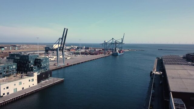 Aerial Drone, Flying Over Water Towards Container Harbour in Copenhagen, Denmark