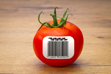 Carbon Footprint barcode label on Tomato, environmental impact sustainability label on food