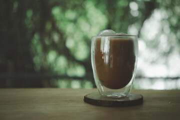 Iced mocha coffee served in the designed double-wall glass.