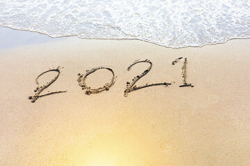 Happy New Year 2021 is coming concept sandy tropical ocean beach lettering