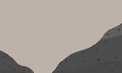 Stone outcrop. Dark grey basalt rock.