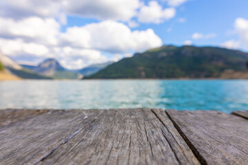 Naklejka na ściany i meble Panoramic view from wooden pier to mountains and azure lake. Beautiful summer landscape with selective focus. Taurus Canyon, Turkey