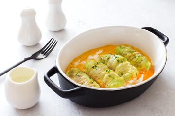Cabbage rolls oven baking in tomato sauce