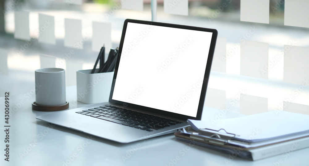 Wall mural modern workspace with computer with blank screen and equipment on white table.blank screen for your 