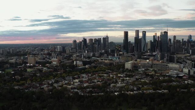 Cities edge meets the town below, Melbourne aerial drone shot in early morning