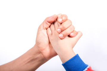adult hand holding a kid's hand isolated