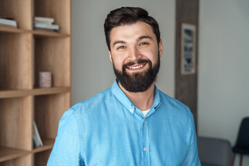 Smiling millennial caucasian man freelancer in office headshot portrait - obrazy, fototapety, plakaty