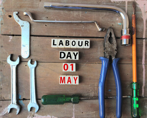 International Labour day Concept on 1st May with blocks with text written on write blocks, copy...