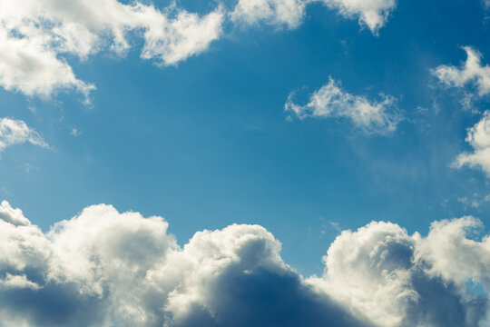 rain clouds on a blue sky background