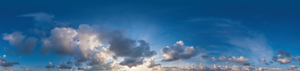 Blue sky panorama with Cirrus clouds in Seamless spherical equirectangular format. Full zenith for use in 3D graphics, game and editing aerial drone 360 degree panoramas for sky replacement.