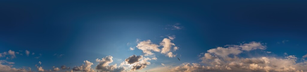 Blue sky panorama with Cirrus clouds in Seamless spherical equirectangular format. Full zenith for use in 3D graphics, game and editing aerial drone 360 degree panoramas for sky replacement.