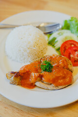 Rice with chicken steak on a plate restaurant cafe