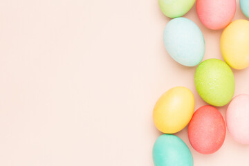 Fototapeta na wymiar Happy Easter card with easter eggs in cream colors. Minimal easter concept with copy space for web banner.