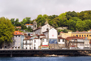 Fototapeta na wymiar Houses and cathedral in old part of Ribeira, Douro river, Porto, Portugal