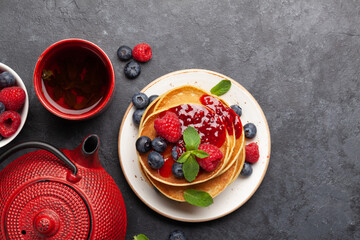 Delicious homemade pancakes with summer berries