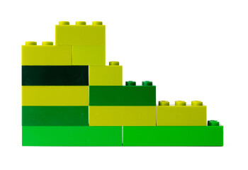 Naklejka premium Colorful plastic toy building blocks isolated on white