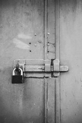 Gate lock on metal door.
