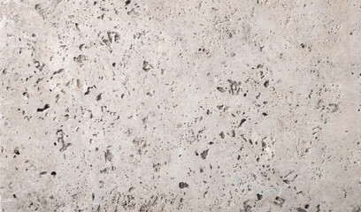 beige concrete wall background with texture and scuffs