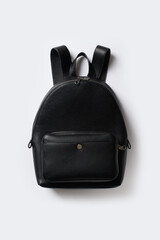 Black leather backpack, minimal casual sfashion style on white background