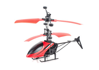 Remote controlled red helicopter isolated