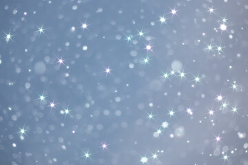 blue snowfall bokeh background, abstract snowflake background on blurred abstract blue