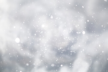 blue snowfall bokeh background, abstract snowflake background on blurred abstract blue