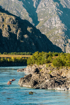 Outdoor vacations. Rafting on a mountain river. Beautiful summer landscape