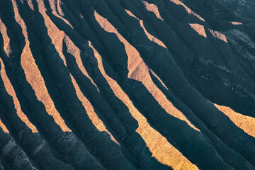 Pattern of mountain range wave surface in Tengger caldera. This mountain range is part of Tengger massif in Bromo Tengger Semeru National Park. Beautiful landscape volcano in East Java, Indonesia.