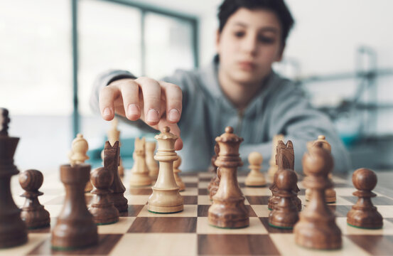 Kids Early Development. Pupil Kid Thinking about His Next Move in a Game of  Chess. Stock Image - Image of child, chess: 172839087