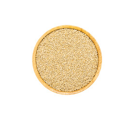 Quinoa seeds in wooden bowl on white background, top view.