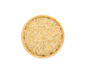 Uncooked dry Jasmine rice in wooden bowl on white background, top view.