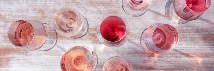 Rose wine panorama, various shades of rose wine - obrazy, fototapety, plakaty