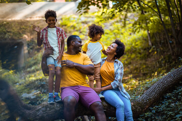 Fototapeta premium African American family in the nature.
