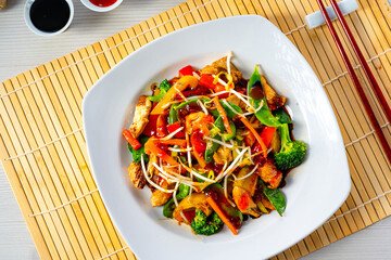 sweet and sour chicken with rice and vegetables