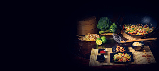 Fried vegetables from the wok with deep fried meat