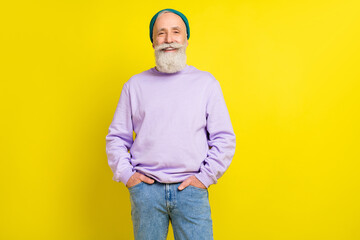 Photo portrait of aged bearded man happy smiling wearing trendy outfit headwear isolated bright yellow color background