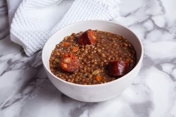 bowl of lentils with chorizo