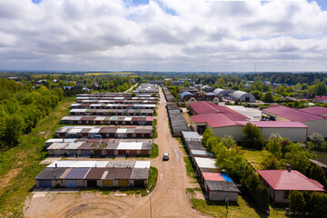 Fototapeta na wymiar view from above of the Dobele city, car garages on the outskirts of the residential area, Latvia