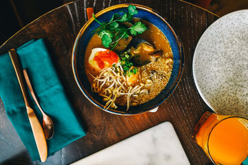 Asian seafood soup, top view. Serving restaurant.