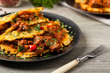 Hungarian potato pancake with goulash