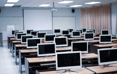 The computer lab is empty at the university.