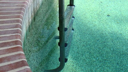 3D illustration - Swimming Pool with clear turquoise water and stairs underwater