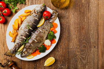 Grilled whole trout. Served with baked potatoes.