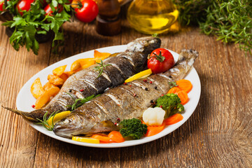 Grilled whole trout. Served with baked potatoes.