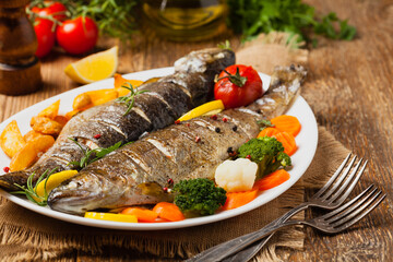 Grilled whole trout. Served with baked potatoes.